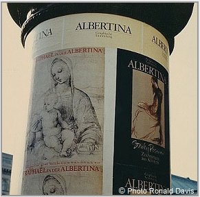 At the entrance to the Albertina, Vienna, the column displaying the posters announcing the museum's exhibitions "Raphael in der Albertina" and "Stanley Roseman - Zeichnungen aus Klstern," 1983.  Photo by Ronald Davis