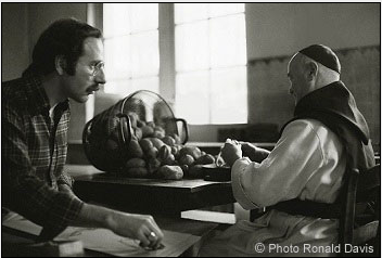 Stanley Roseman drawing a Belgian Trappist monk in the kitchen.  Photo by Ronald Davis.