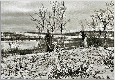 Myrdene Anderson (left) and Stanley Roseman (right) collecting brushwood and twigs with which to build a smokey fire at the river's edge to signal Ris'ten's brother to come to get them in his rowboat. Kautokeino, 1976. Photo  Ronald Davis